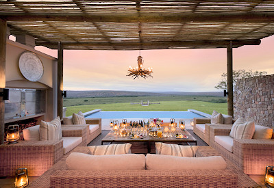 Outdoor lounge and dining terrace at Kwandwe Fort House Kwandwe Private Game Reserve Eastern Cape