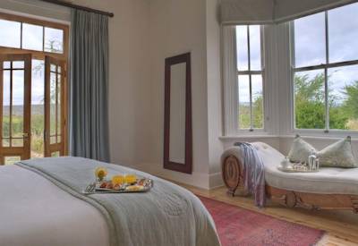 Cosy suite blending traditional and modern comforts at Kwandwe Uplands House Eastern Cape