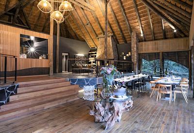 Thatched double-volume lounge and dining area at Shamwari Bayethe Tented Lodge Shamwari Reserve