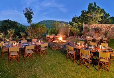 Outdoor boma fireside dining at Shamwari Bayethe Tented Lodge Shamwari Private Game Reserve