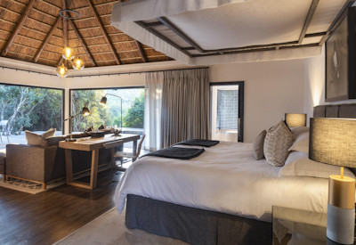 Thatched safari suite exterior at Shamwari Eagles Crag Lodge Shamwari Private Game Reserve