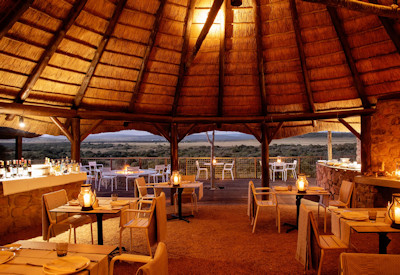 Colourful indoor breakfast and dining room at Shamwari Riverdene Family Lodge Shamwari Reserve