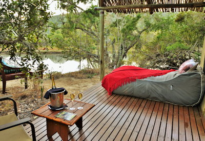 Private wooden viewing deck overlooking Kariega River at Sibuya Forest Camp Eastern Cape