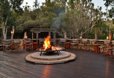 Open-air boma dining under African stars at Sibuya Forest Camp Sibuya Game Reserve Eastern Cape