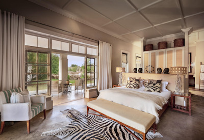 Luxury bedroom with large glass doors