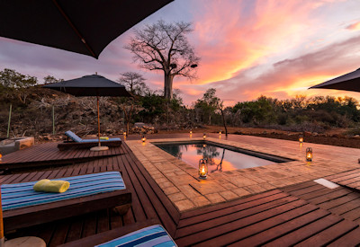 Intimate pool with sun loungers