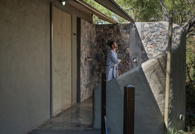 Safari camp offers guests both indoor and outdoor showers