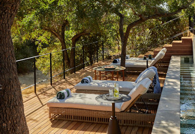 Main swimming pool area overlooking riverbed