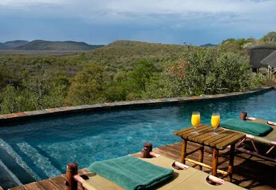 Swimming pool and deck at Buffalo Ridge Safari Lodge Madikwe Game Reserve