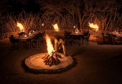 Outdoor boma dining area at Impodimo Game Lodge Madikwe Game Reserve South Africa