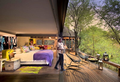Spacious thatched safari suite with canvas walls at Jaci's Safari Lodge Madikwe