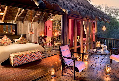Luxury thatched treehouse suite on wooden stilts at Jaci's Tree Lodge Madikwe