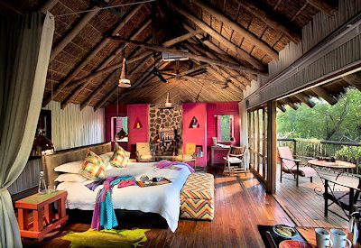 King-sized bedroom with Marico River views at Jaci's Tree Lodge Madikwe Game Reserve