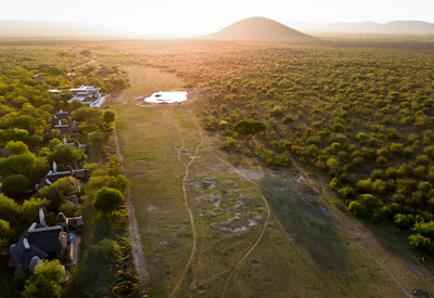 Rim-flow swimming pool with sweeping Madikwe Game Reserve views at Jamala Madikwe