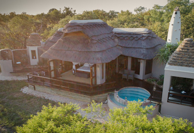 Private rim-flow plunge pool and deck at Jamala Madikwe Royal Safari Lodge Madikwe