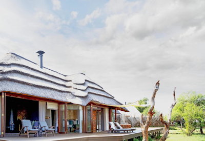 Thatched luxury suite exterior at Madikwe Hills Game Lodge Madikwe
