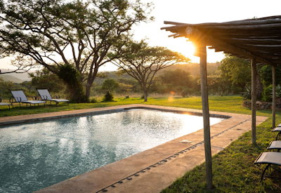 Swimming pool with Isandlwana Battlefield views at Fugitives Drift Guest House Natal