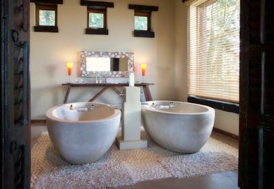 Romantic honeymoon suite with twin freestanding bathtubs at Hartford House KwaZulu-Natal