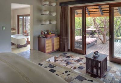 Spacious mountain suite with private viewing deck at AndBeyond Phinda Mountain Lodge Phinda Reserve