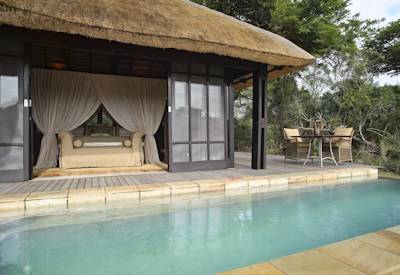 Lap pool with panoramic Phinda Private Game Reserve views at AndBeyond Phinda Vlei Lodge