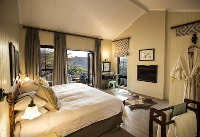 Beautifully appointed cottage suite with wood panelling at Three Tree Hill Lodge Spioenkop
