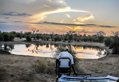 Exclusive unfenced tented camp campfire Kruger on foot walking safari South Africa