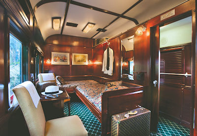 Rovos Rail double-bed Pullman suite interior Southern Cross luxury train safari South Africa