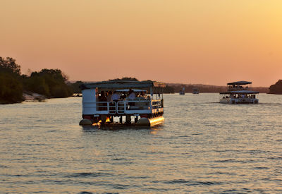 Zambezi River sunset cruise pontoon boats Victoria Falls Rovos Rail Southern Cross Safari