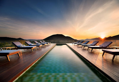 Outdoor pool with sun loungers and enjoy high speed wifi