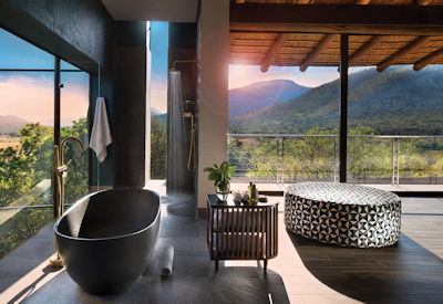 Stunning and private en-suite bathroom with separate tub
