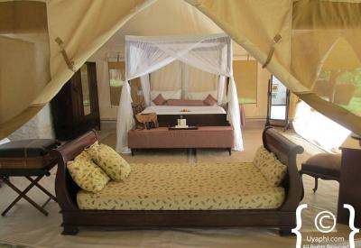 Cottars 1920s Camp Kenya luxury tent bathroom antique furnishings 1920s recreation Masai Mara Kenya