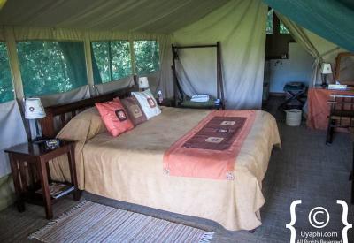 Governors Camp Kenya tent exterior canvas flap open savannah wilderness view Mara River Kenya