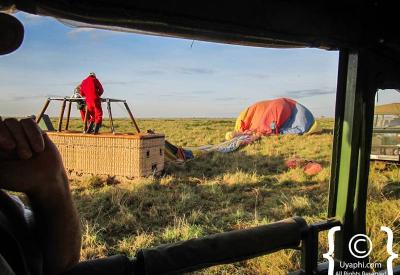 Masai Mara balloon safari Kenya champagne breakfast open plain experienced safari chef Kenya