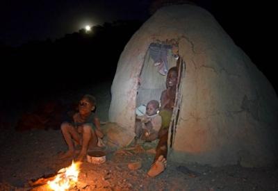 Himba woman Kaokoland Namibia ochre skin traditional dress cattle goats happy resilient people