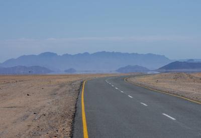 Driving to Sossusvlei Namibia orange dunes blue sky contrasting colours Namib Desert photography