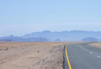 Driving to Sossusvlei Namibia wildlife oryx silhouette dune Namib Desert photography