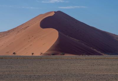 Road to Sossusvlei Namibia sunrise silhouette dunes Namib Desert photography golden hour