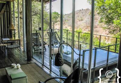 Singita Sweni Lodge bathroom bathtub river views indoor outdoor shower iPod music system Kruger Park