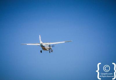 Bush airstrip landing approach light aircraft Botswana fly-in safari photography
