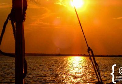Chobe River golden sunset reflection boat cruise Botswana Kasane photography