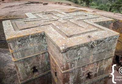 Bet Giyorgis Lalibela Ethiopia pilgrim white shawl Ethiopian Orthodox sacred atmosphere