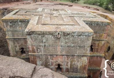 Bet Giyorgis Church Lalibela Ethiopia pathway down exterior carved rock corridor photography