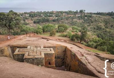 Bet Giyorgis Church Lalibela Ethiopia pathway down exterior carved rock corridor photography