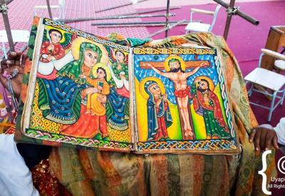 Ethiopian church interior narrative mural biblical scenes rich pigments religious art8Ethiopian Orthodox church painting Virgin Mary Maryam icon Lalibela religious art9Ancient Ethiopian parchment illuminated manuscript religious art photography Uyaphi10Gondar Ethiopia Debre Berhan Selassie painted ceiling 135 faces angels Ethiopian art11Ethiopian traditional church painting Saint George dragon red golden Ethiopia religious art12Lalibela Ethiopia carved rock church window stone architecture religious art pho
