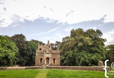 Fasilides Bath Gondar Ethiopia exterior stone wall towered gates compound photography