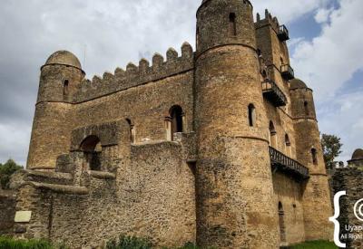 Fasil Ghebbi Gondar Ethiopia castle detail carved stone windows arches craftsmanship photography