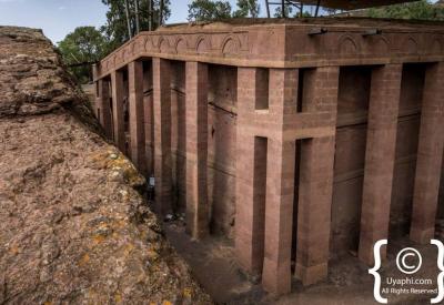 Lalibela Southern Cluster stone carved church exterior dramatic granite face Ethiopia photography
