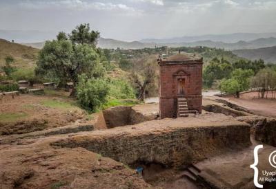 Lalibela Southern Cluster stone carved church exterior dramatic granite face Ethiopia photography