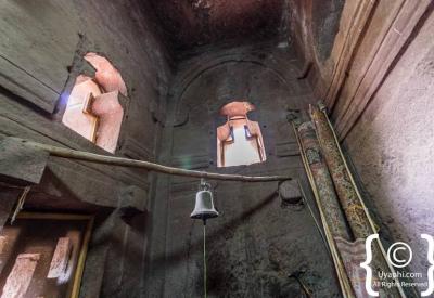 Lalibela Southern Cluster Ethiopian Orthodox priest interior church sacred site photography