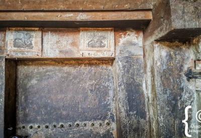Yemrehanna Kristos Ethiopia mummified bodies thousands stacked cave behind fence photography
